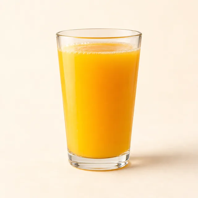 Copo de suco de laranja — imagem ilustrativa